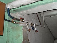 Врезка запорной арматуры и балансировочного крана, подводка отопительного прибора первого подъезда